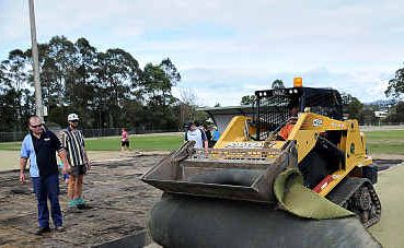 A bob cat pulls up the turf from the Gympie Hockey Club’s old synthetic field on the weekend. A bob cat pulls up the turf from the Gympie Hockey Club’s old synthetic field on the weekend.
